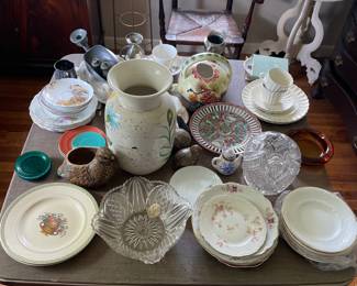 Tabletop of ceramic/glass dishes in office