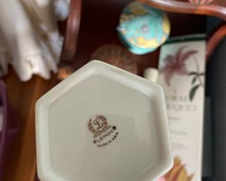 Bottom side of decorative white flower vase 