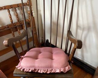 Vintage wooden rocking chair with golden designs 