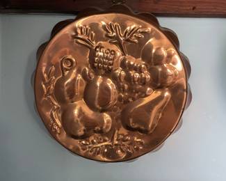 Textured bronze dish in kitchen 