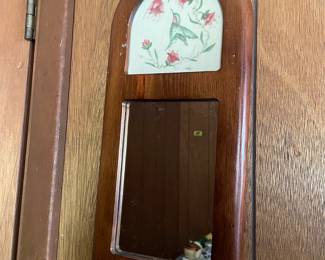 Wooden and floral decorative mirror in the den 
