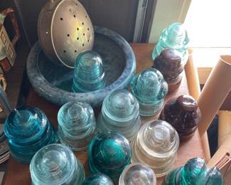 Assorted glassware in den 