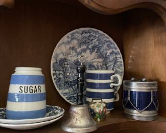Assorted blue and white ceramics in den 