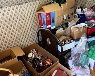 Assorted boxes of Christmas decorations