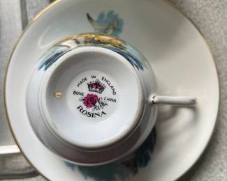 Bottom side of ceramic nautical teacup and saucer with gold detail 