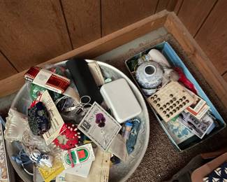 Boxes of assorted goodies in den 