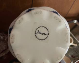 Bottom side of white and blue ceramic dish 