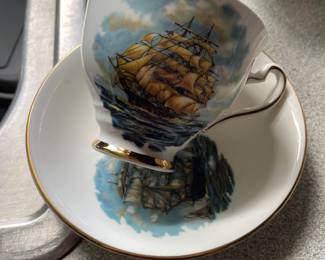 Ceramic nautical teacup and saucer with gold detail 