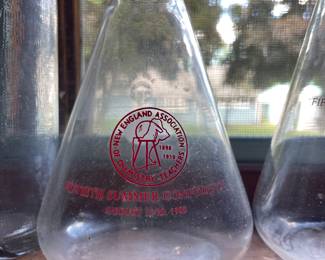 Closeup up assorted glassware in den 