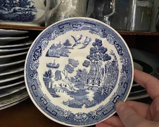 Intricate white and blue ceramic plate in kitchen 