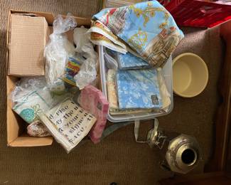 Box of assorted goodies in den 