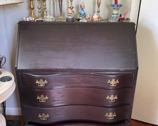 Dresser with candlesticks in office 