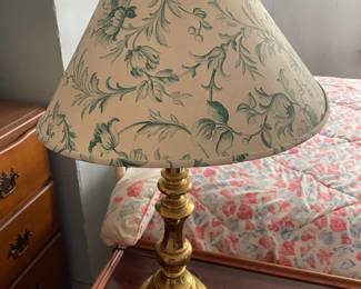 Gold lamp with cream and green plant design lampshade