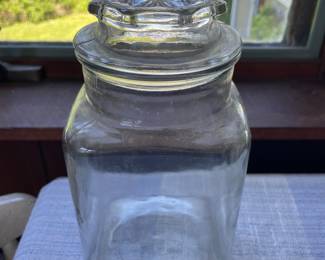 One large glass container 