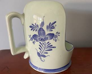 Side of decorative ceramic candle holder 