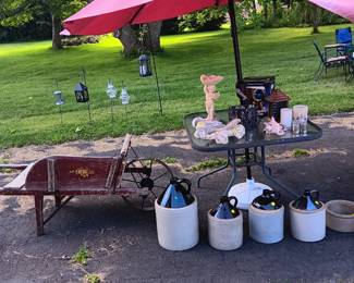 Antique flower cart, lawn and garden ornaments. umbrella, jugs.