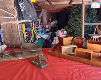 Large scales, smaller scales, wooden boxes, tray.