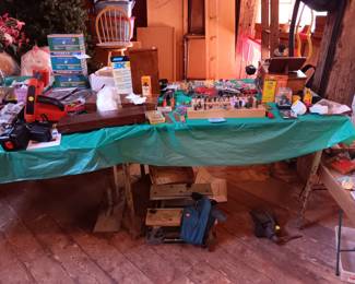 Bench anvil, wood wall phone, bits, tools, tool belt, timers.