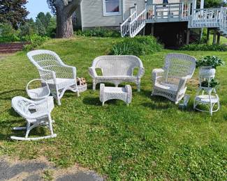 Wicker sofa, rocker, chair, child's rocker, coffee table, hammock, basket, flower basket, 3-piece display unit.