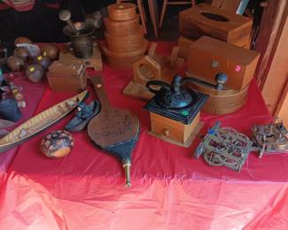 3 antique barbells, mortar and pestle, 2 canoes, bellows, coffee grinder, nestled wood sewing boxes, wood tissue box covers, men's jewelry box, 2 brass clock workings.