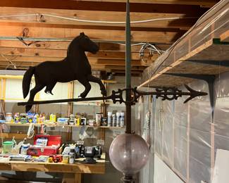 Closer look at weathervane and lightning rod atop the cupola shown in the preceding photo.