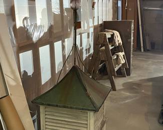 Antique cupola with copper roof, weathervane and lightning rod.