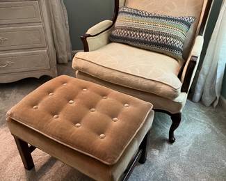 French Provincial-style upholstered accent chair; upholstered ottoman.