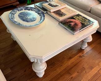 Painted coffee table; nature-/wildlife-themed coffee table books; large platter by Wood’s Ware (England), “Enoch Wood’s English Scenery.”