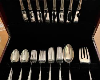 34-piece sterling flatware set by Lunt.