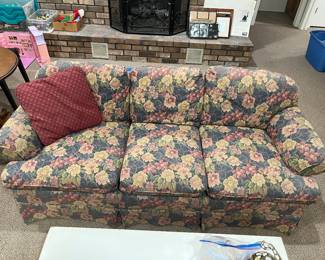 One of two matching upholstered couches by Vanguard.