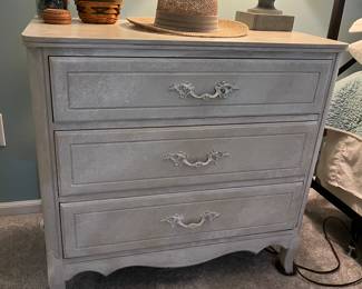 Three-drawer dresser.