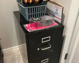 Two-drawer filing cabinet.