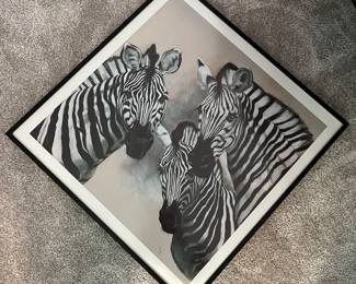 Framed print of three zebras, numbered 8/225.