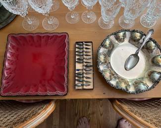 Round platter marked “REAL/925 / STERLING” (right in photo); sterling silver serving spoon (shown in platter); vintage set of corn cob holders (center); Roscher stoneware platter (left).