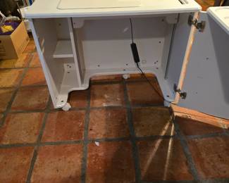 Koala Studio has a machine lift that raises or lowers your machine by remote control.