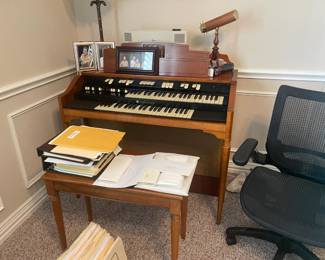 Hammond organ with hundreds of sheets/ books of music