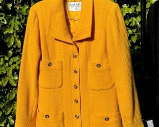 Chanel mustard yellow boucle skirt suit 1990s.