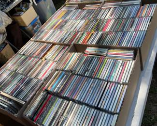 Hundreds of DVDs / CDs