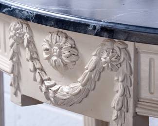 Detail on faux marble demilune table