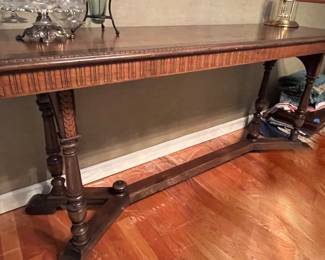 Carved sofa table