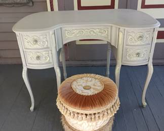 Vanity and  decorated ottoman 