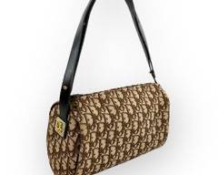 CHRISTIAN DIOR Leather and Canvas Signature Handbag with Convertible Strap. Gold Tone Hardware.
