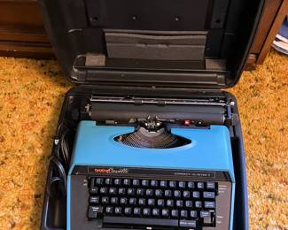 Electric type writer