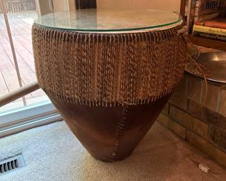 Drum with glass top .  It was used as a table