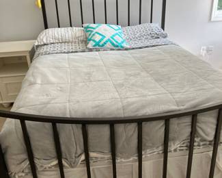 Charles  Roger’s queen  wrought iron bed 

