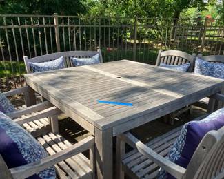Teak square outdoor  table with two benches and four chairs in good condition 