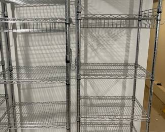 Metal shelving with baskets built in ,and hooks 