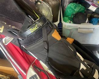 Two sets of golf gear