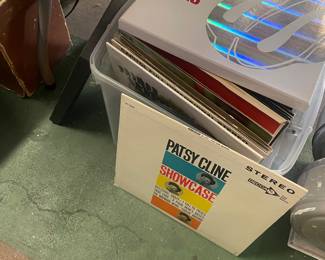 Vinyl, victrola, nice stereo equipment, tons of car stereos and speakers, photography green screens, selfie sticks, light boxes