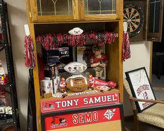 Lots of SEMO football gear. Cabinet is for sale too!
